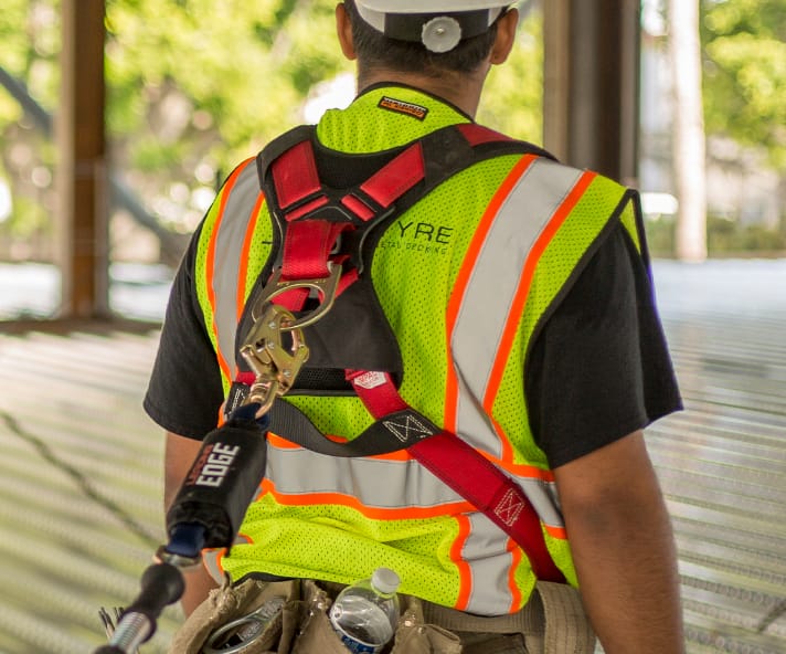 Fall arrest safety harnesses